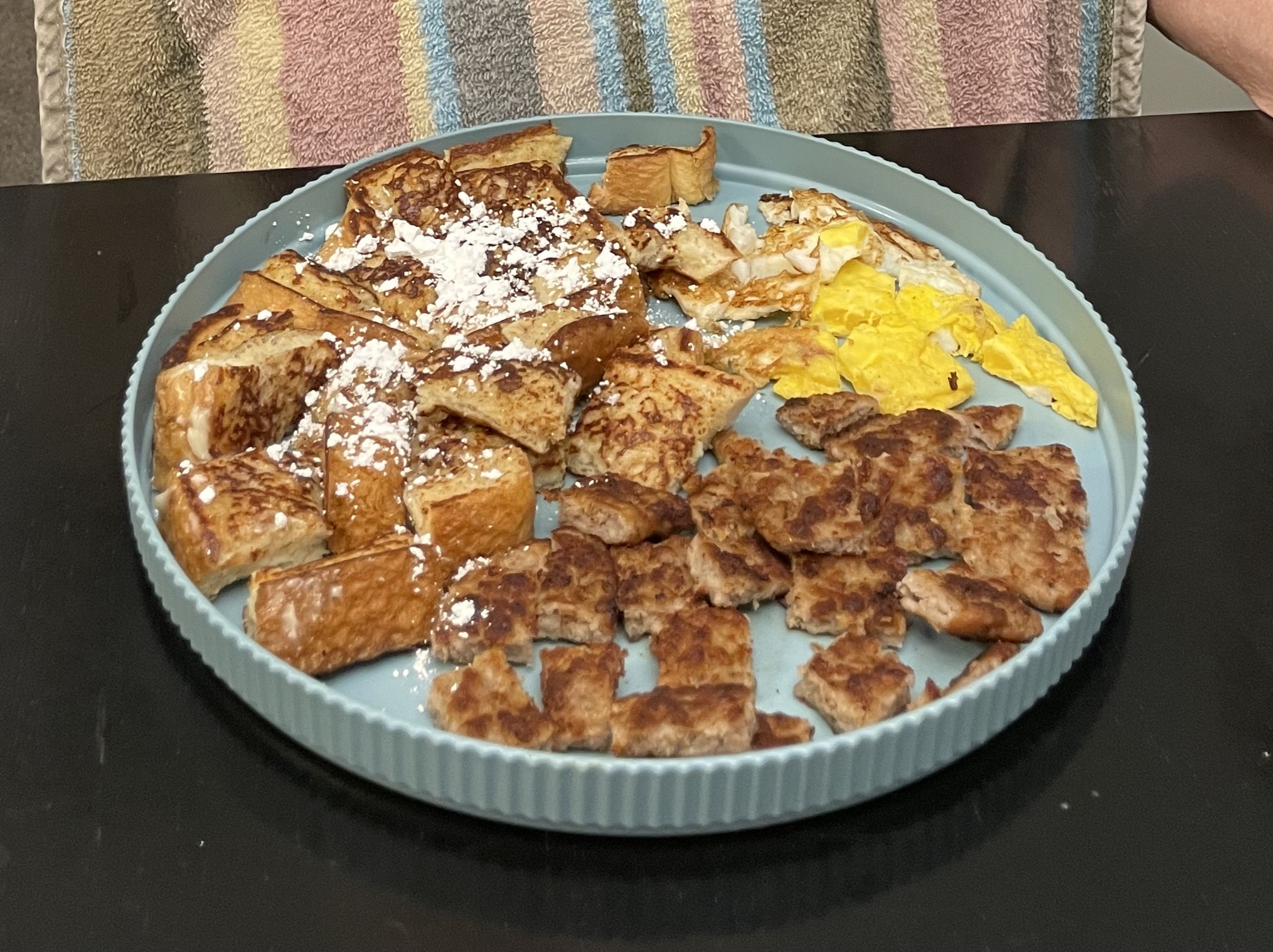 Homemade Daddy-O’s French Toast served on a breakfast plate